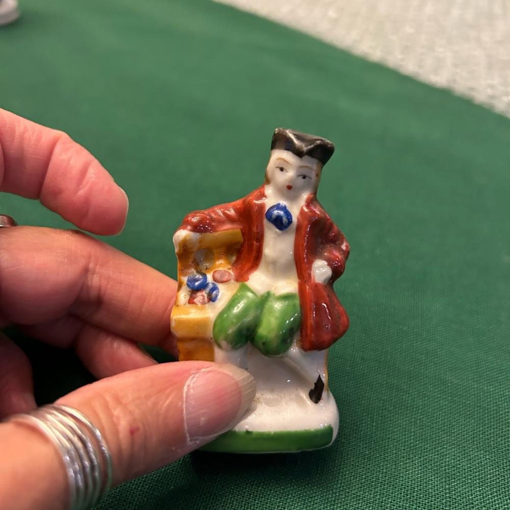 Occupied Japan, man on bench figurine